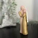 Lumânare artistică Îmbrățișare auriu, cu parfum delicat și finisaj luxos, decorează casa ta